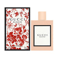 Gucci Bloom perfume bottle and packaging with floral design